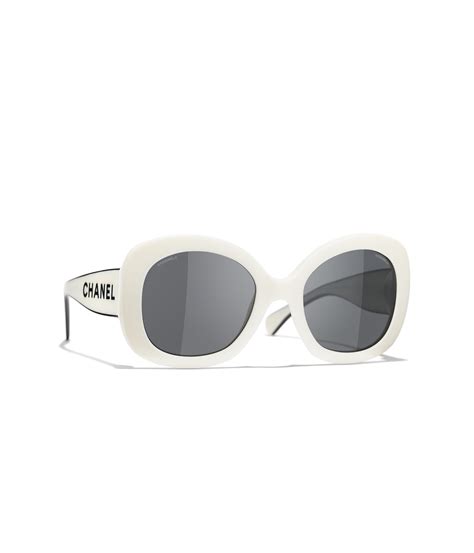 chanel sunglasses with chain uk|Chanel sunglasses with white trim.